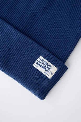 Трикотажная шапка в рубчик с этикеткой- Заказать в России