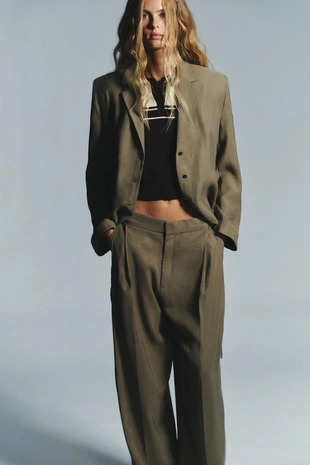 Брюки с двойными защипами и клапанами