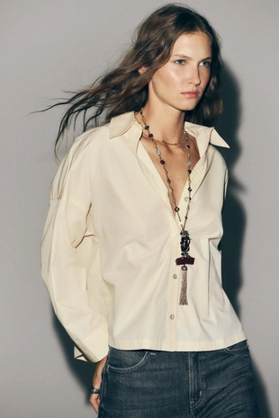 Ожерелье с звеньями, камнями и птицей- Заказать в России