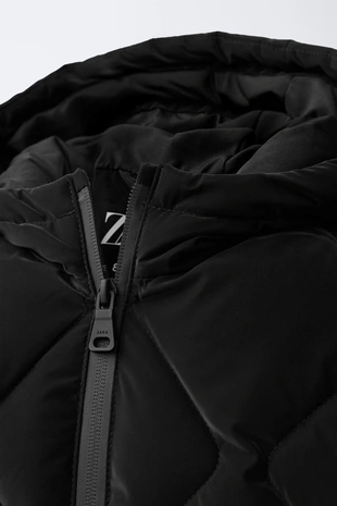 Легкое стеганое прорезиненное пальто- Заказать в России