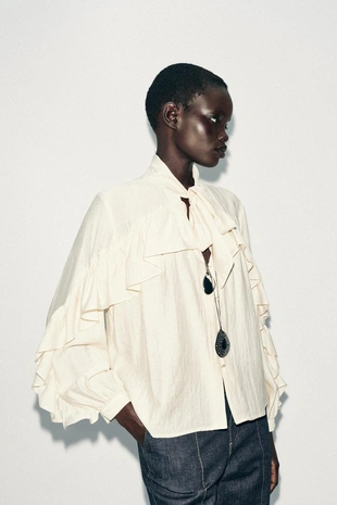 Блуза с воланами и бантом- Заказать в России