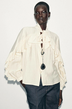 Блуза с воланами и бантом- Заказать в России