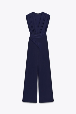 Длинный комбинезон с подплечниками и драпировкой- Заказать в России