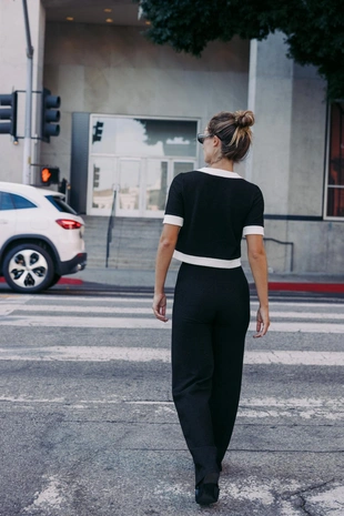 Брюки из букле с контрастной отделкой- Заказать в России