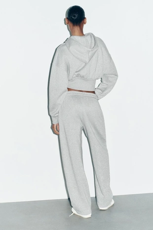 Брюки из мягкой ткани с металлизированной нитью- Заказать в России