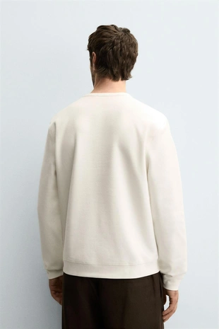 Лонгслив в рубчик с пуговицами на горловине- Заказать в России