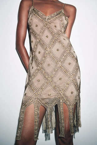 Платье из полупрозрачной ткани с вышивкой- Заказать в России