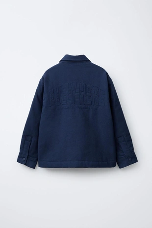 Стеганая куртка-рубашка с нашивкой- Заказать в России