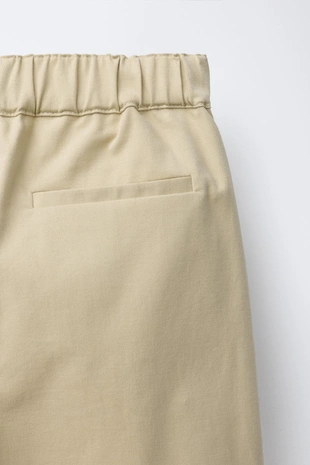 Брюки с вышивкой на карманах- Заказать в России