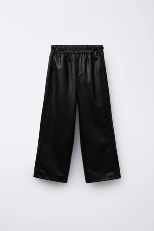 Брюки из искусственной кожи с бантами- Заказать в России