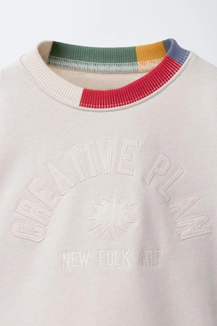 Толстовка с вышитой надписью и контрастной отделкой в рубчик- Заказать в России