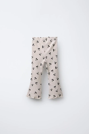 Мягкие расклешенные брюки с принтом- Заказать в России
