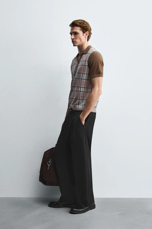 Трикотажное поло в клетку с принтом- Заказать в России