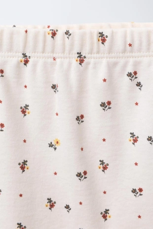 Комплект футболка и ползунки с цветочным принтом- Заказать в России