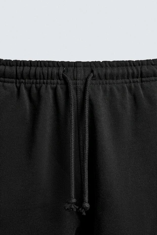 Брюки-джоггеры классического кроя- Заказать в России