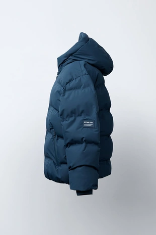 Стеганый пальто с нашивкой WATER REPELLENT- Заказать в России