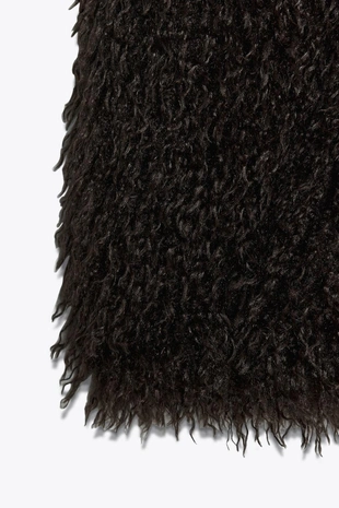 Жилет из искусственного меха- Заказать в России