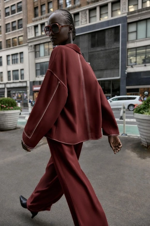 Широкие брюки с контрастной строчкой- Заказать в России