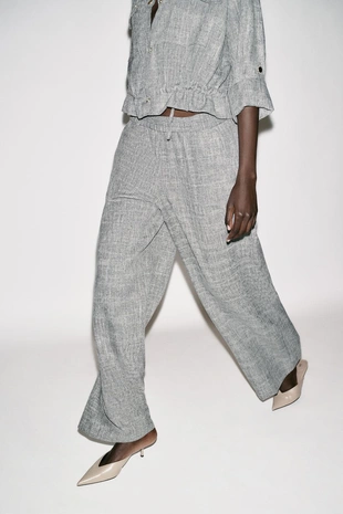 Широкие брюки с меланжевым эффектом- Заказать в России