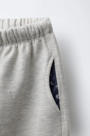 Брюки из флиса с принтом и карманами