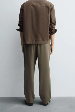 Брюки-джоггеры классического кроя- Заказать в России