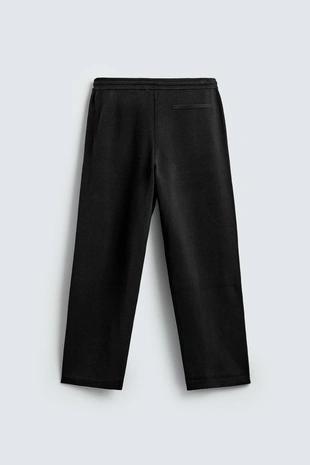 Брюки из трикотажа с рельефной структурой- Заказать в России