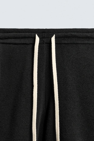 Брюки из трикотажа с рельефной структурой- Заказать в России