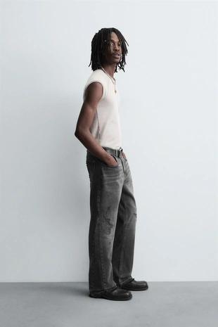 Расклешенные джинсы с дырками- Заказать в России