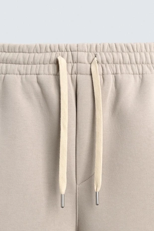 Брюки BALLOON FIT с эффектом неопрена- Заказать в России