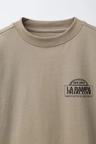 Лонгслив с принтом-логотипом- Заказать в России