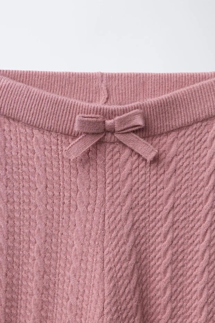 Трикотажные легинсы с косами