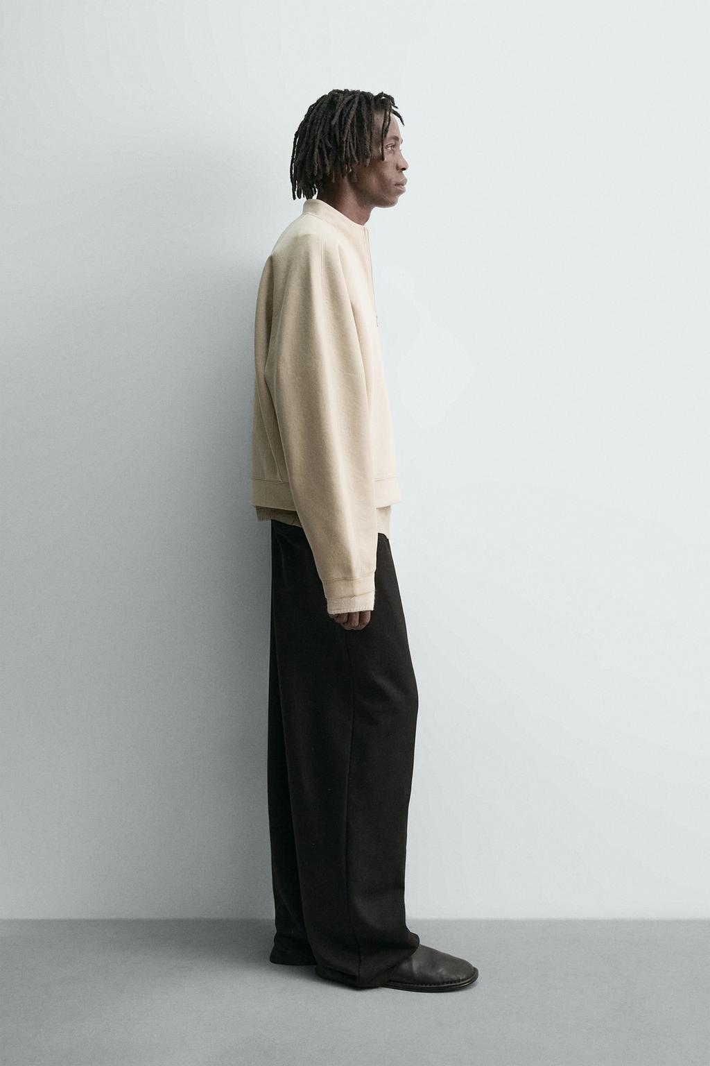 УКОРОЧЕННАЯ ТОЛСТОВКА ИЗ НЕОПРЕНА С ЗАКЛЕПКАМИ