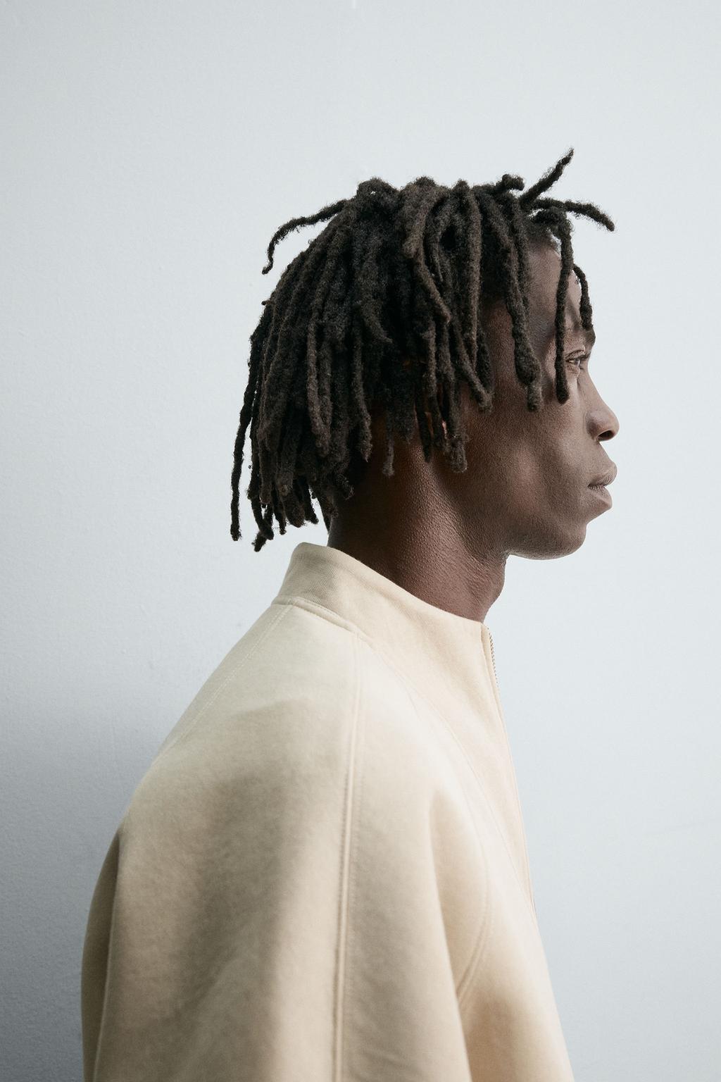 УКОРОЧЕННАЯ ТОЛСТОВКА ИЗ НЕОПРЕНА С ЗАКЛЕПКАМИ