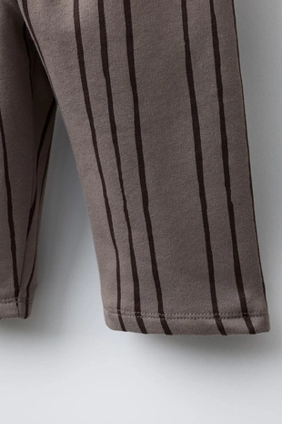 Брюки в полоску с нашивкой- Заказать в России