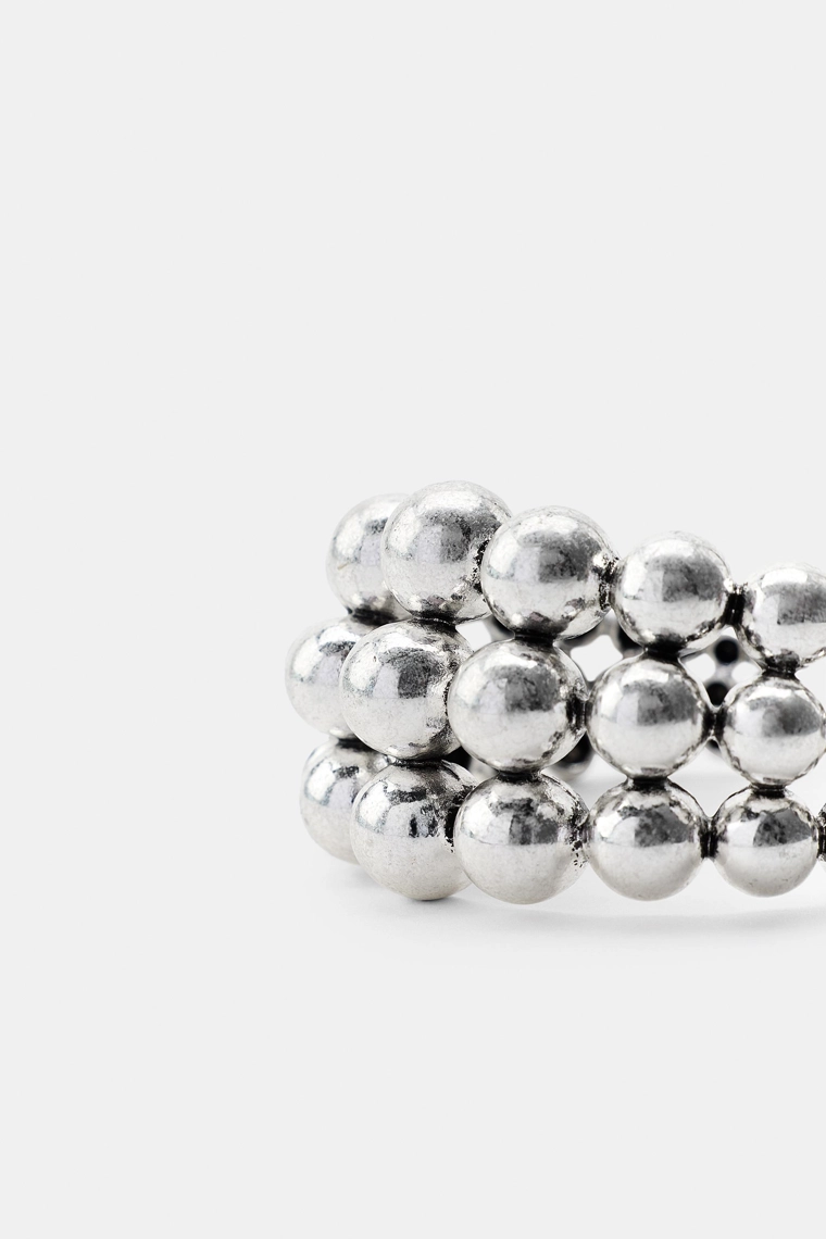 Металлический браслет с металлическими бусинами