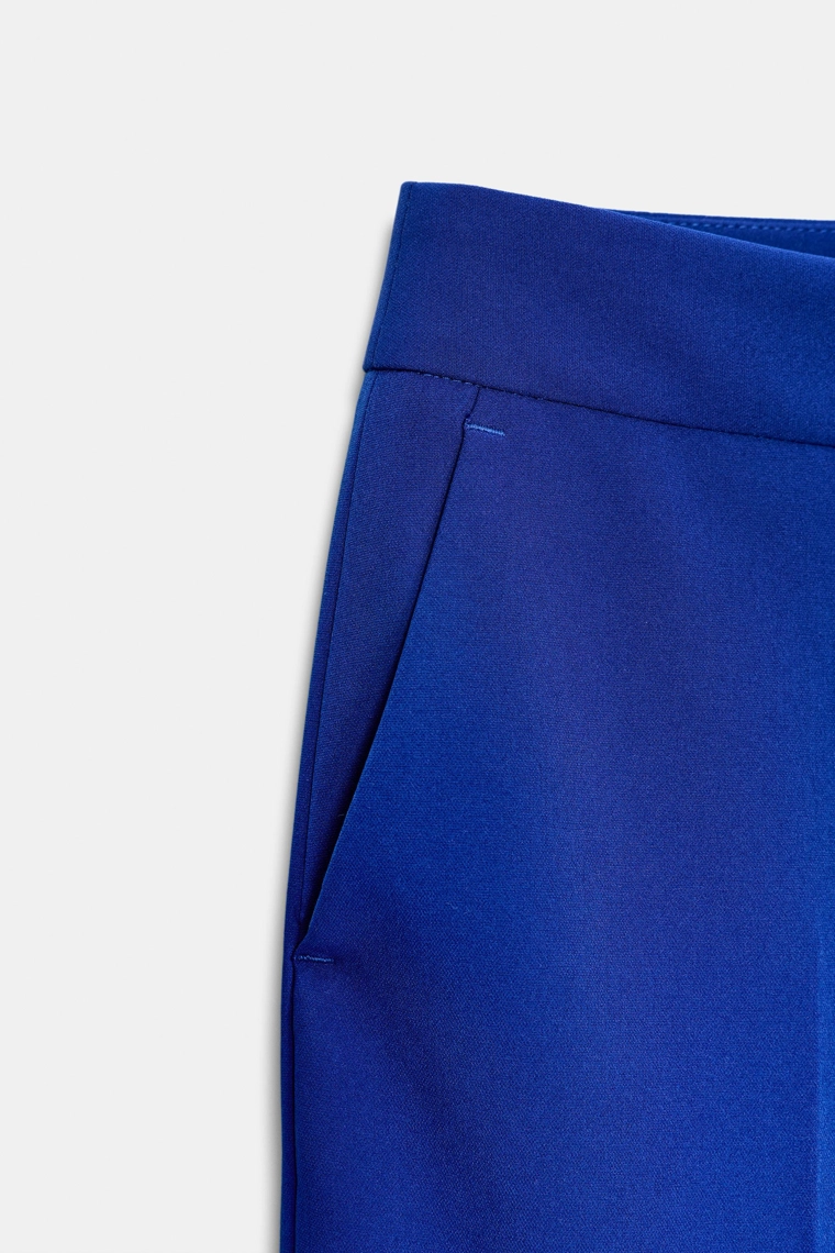 Брюки с высокой посадкой и зауженные к низу