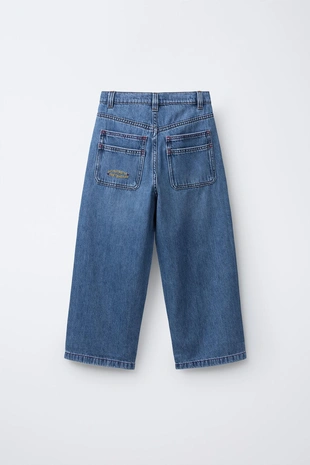 Джинсы свободного кроя с вышивкой- Заказать в России