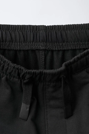 Джоггеры из мягкой ткани с комбинированными элементами- Заказать в России