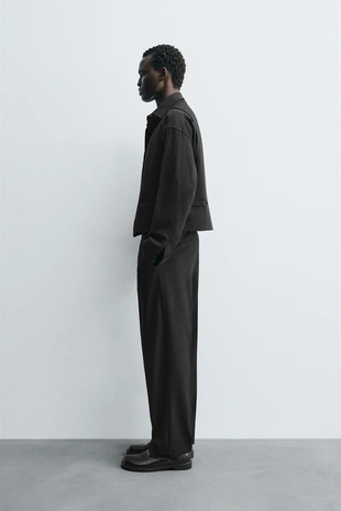 Костюмные брюки из рельефной ткани- Заказать в России