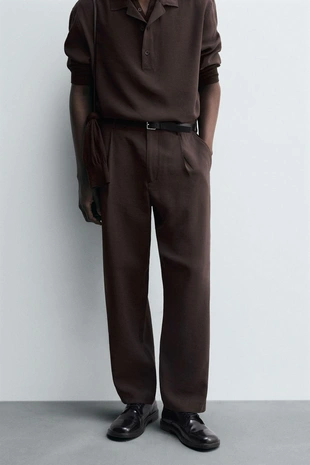 Потоковые плиссированные брюки- Заказать в России