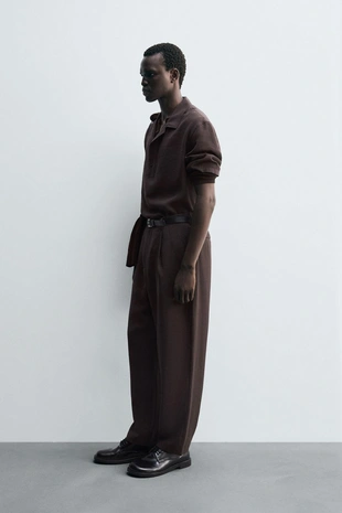 Потоковые плиссированные брюки- Заказать в России