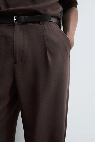 Потоковые плиссированные брюки- Заказать в России