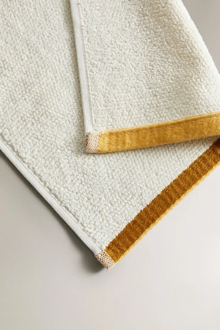 Ivory | 9581/013/741 - Zara Полотенце для ванны RICE STITCH с цветной каймой