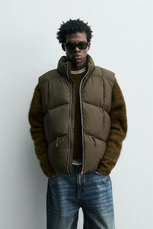 Стеганый жилет из 100% перьев- Заказать в России