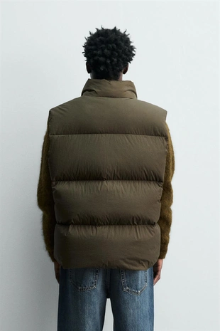 Стеганый жилет из 100% перьев- Заказать в России