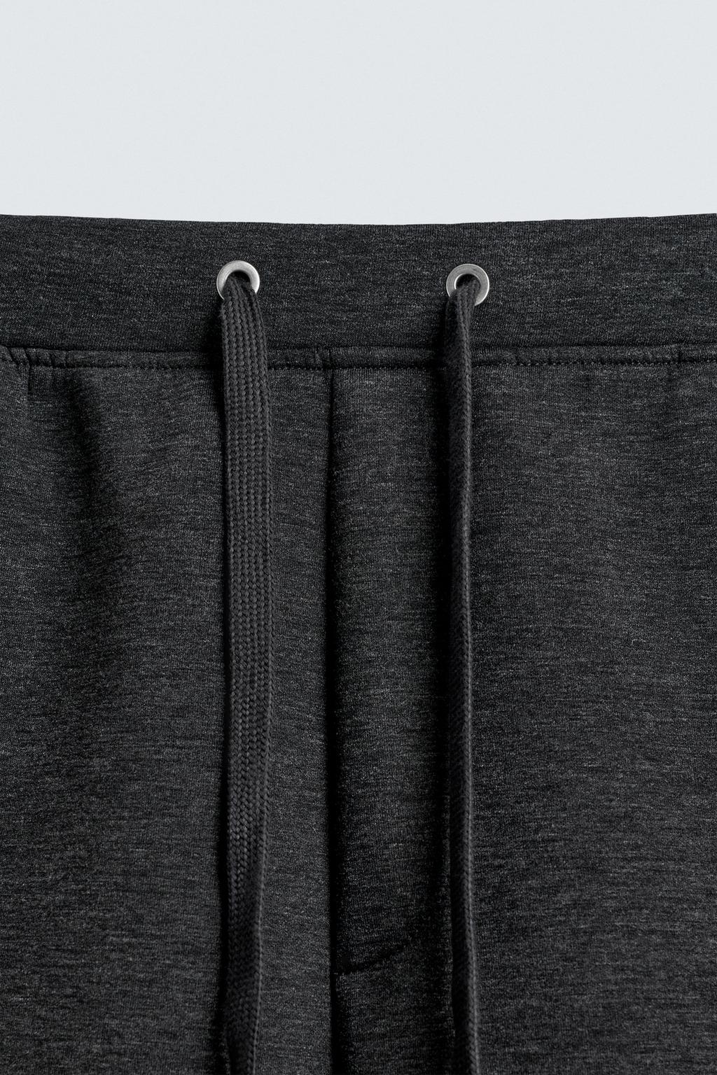 БРЮКИ WIDE FIT С ЭФФЕКТОМ НЕОПРЕНА