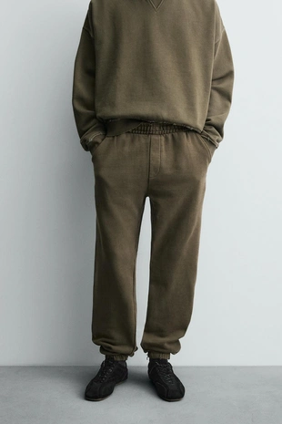 Брюки RELAXED FIT с эффектом потертости- Заказать в России