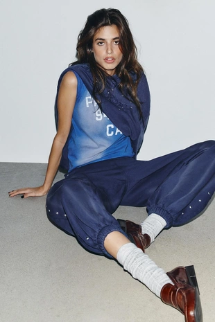 Джоггеры из ткани с эффектом потертости с заклепками- Заказать в России