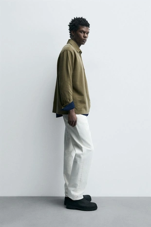 Поло из рельефного пике с эффектом потертости- Заказать в России