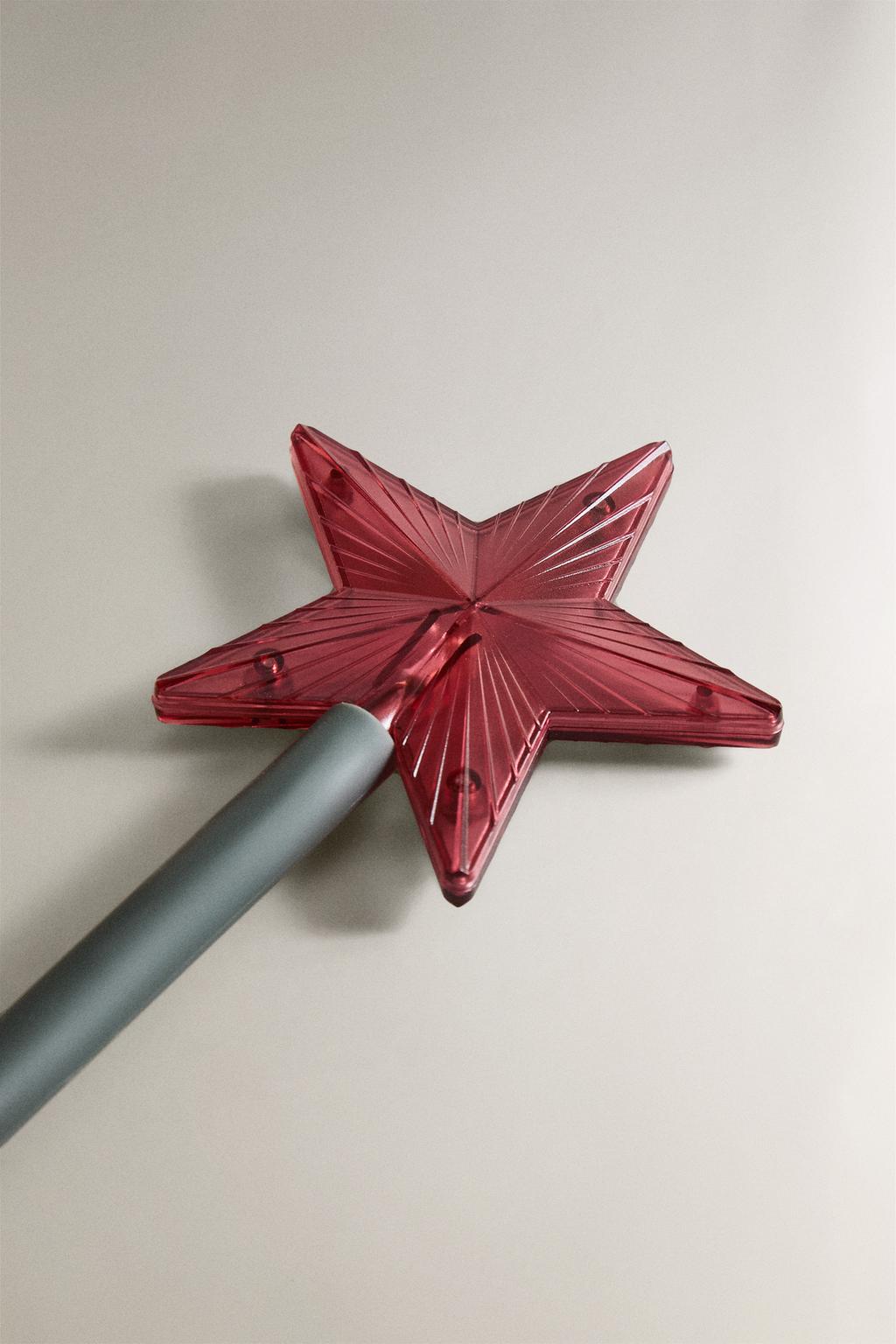 Волшебная палочка рождественское волшебство с звездой, светящейся